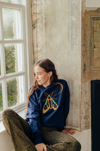 Embroidered large festive moth sweater