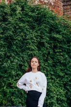 Load image into Gallery viewer, festive bugs embroidered sweater with bug star sleeve detail
