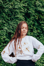 Load image into Gallery viewer, festive bugs embroidered sweater with bug star sleeve detail