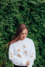 Load image into Gallery viewer, festive bugs embroidered sweater with bug star sleeve detail