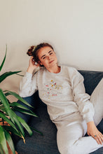 Load image into Gallery viewer, Festive lots of dinos embroidered sweater