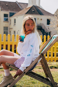 Embroidered bee sleeve sweater