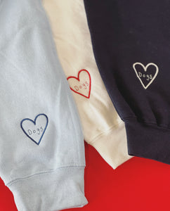 Thank goodness for dogs embroidered sweater with dog heart sleeve detail