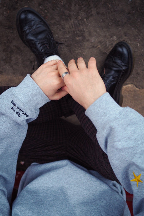 Mini smiley stop worrying embroidered sweater