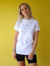 Load image into Gallery viewer, Floral embroidered organic t-shirt design