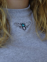 Load image into Gallery viewer, Mini turquoise moth embroidered organic t-shirt