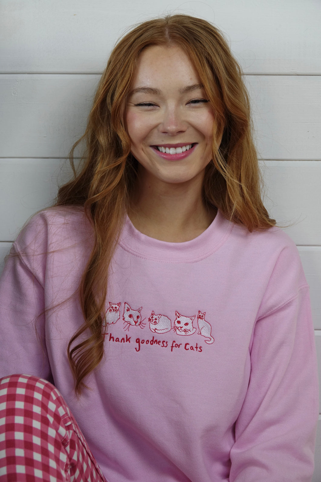 Thank goodness for cats embroidered sweater with cat heart sleeve detail