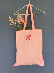 Embroidered initial tote with mini bee strap