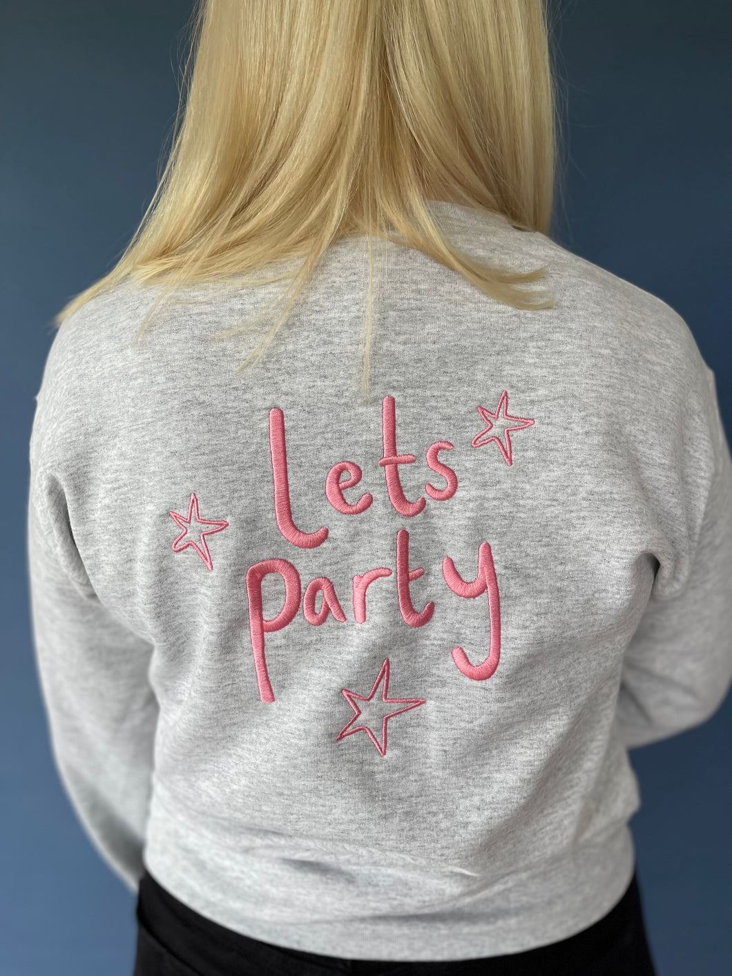 Lets party sweater with sleeve detail