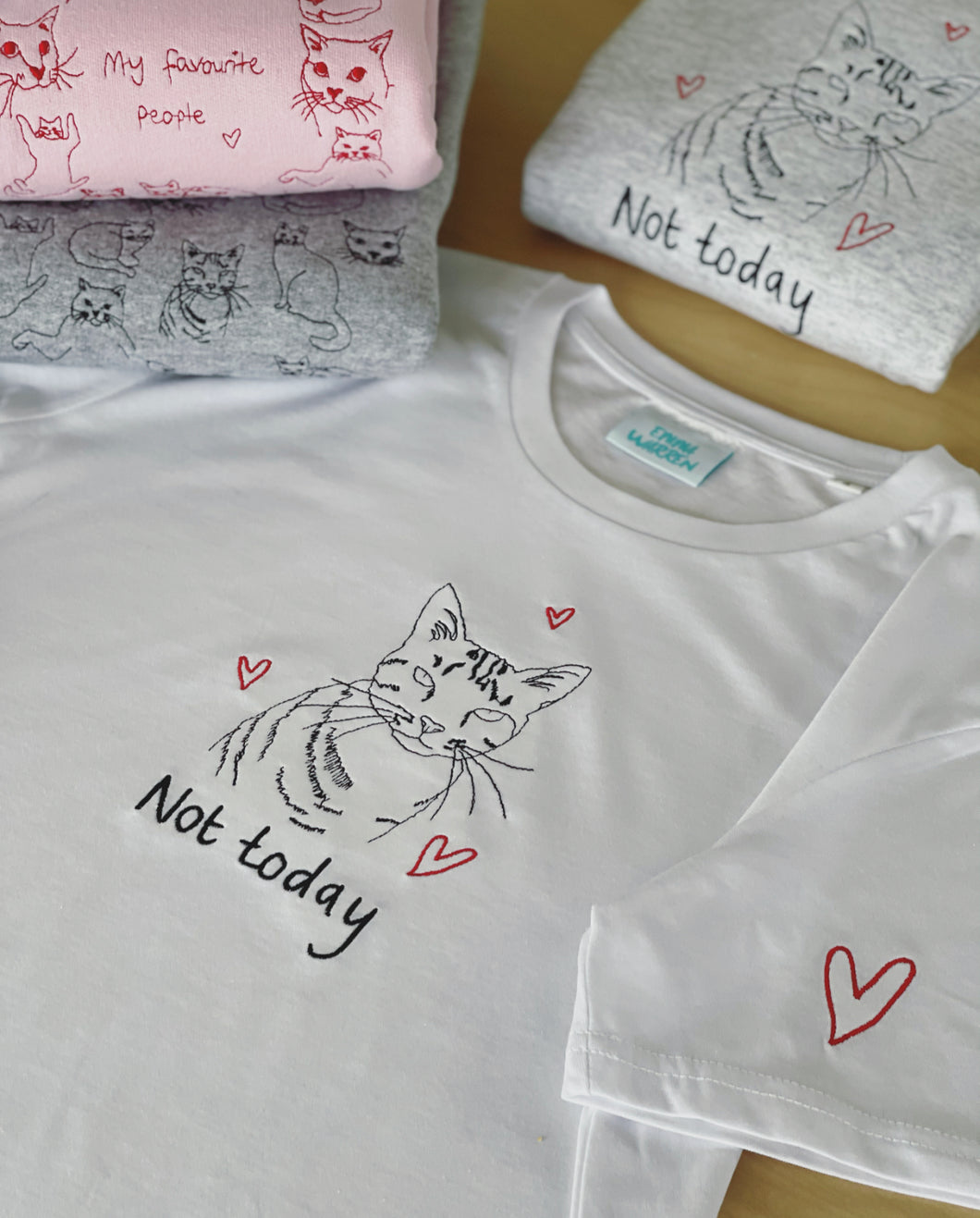 Not today slogan and cat embroidered organic t-shirt with heart sleeve