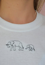 Load image into Gallery viewer, Elephant embroidered organic t-shirt design.