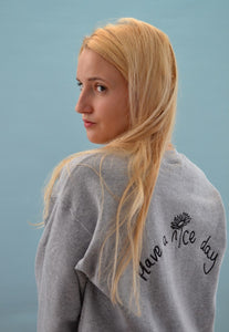 Have a nice day and daisy embroidered slogan sweater