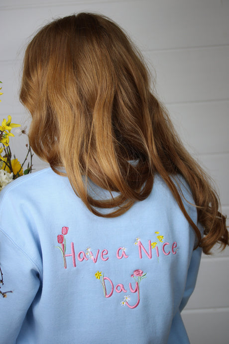 Embroidered Floral ' have a nice day ' back sweater