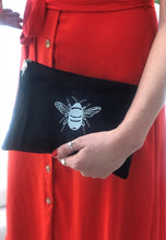 Load image into Gallery viewer, Canvas clutch bag in black with silver bee embroidery