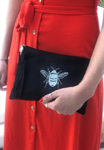 Load image into Gallery viewer, Canvas clutch bag in black with silver bee embroidery